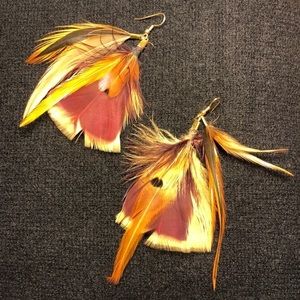 Feather earrings. Plum, cream, rust and black colors. Gold toned hooks. EUC